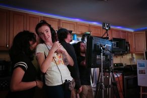 Writer/Director Kyra Gardner confers with Producer Cristina Trabada on the set of 