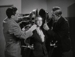 Boris Karloff, Richard Fiske, and Shirley Warde in The Devil Commands (1941)