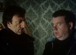 Howard Attfield and Ian McNeice in The Optimist (1983)
