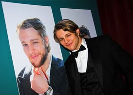 Chase Coleman posing for a launch party for Season 1 of In Between Men.