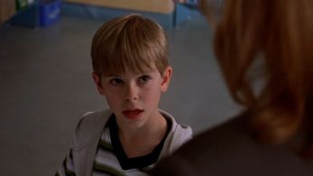 Penelope Ann Miller and Sage Testini in Dead in a Heartbeat (2002)