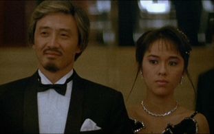Regina Kent and Dean Shek in A Better Tomorrow II (1987)