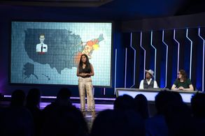D.L. Hughley and Mona Chalabi in The Fix (2018)