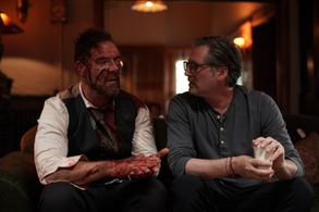 Director Adam Cooper with Marton Csokas on the set of SLEEPING DOGS