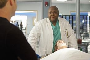 Windell Middlebrooks and Danielle Litak in Body of Proof (2011)