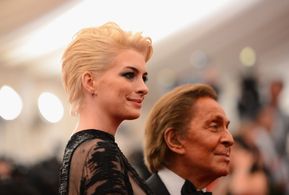 Anne Hathaway and Valentino Garavani