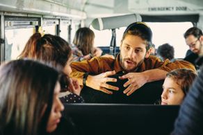 Grant Conversano directing the school bus scene in Alma.