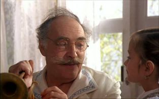 Nadezhda Mikhalkova and Vyacheslav Tikhonov in Burnt by the Sun (1994)