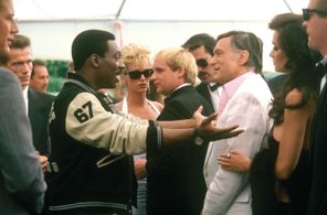 Eddie Murphy, Jürgen Prochnow, Judge Reinhold, Paul Guilfoyle, Hugh Hefner, and Carrie Leigh in Beverly Hills Cop II (19