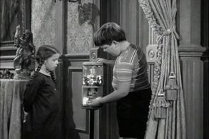 Lisa Loring and Ken Weatherwax in The Addams Family (1964)