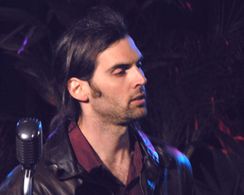 Actor/Director Peter McGennis on stage in Queen City