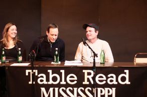 At event, table read for feature film, 