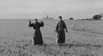 Ninetto Davoli and Totò in The Hawks and the Sparrows (1966)