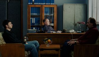 Vlad Ivanov and Dragos Bucur in Police, Adjective (2009)