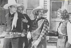 Dick Botiller, Al Bridge, Iris Meredith, and Charles Starrett in The Man from Sundown (1939)