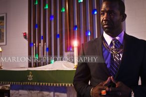 Still of Bradford(Pastor) from Lecrae's MTV Music video 