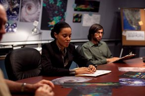 Secretary West (Jamie Burton-Oare) and Dr. Flynn (Mitch) assess the situation. Production still, Super Cyclone