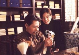 Baoguo Chen and Wei Zhao in Moment in Peking (2005)