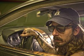 Jase Haber with his Aston Martin DB9