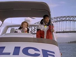 Raelee Hill and Jay Laga'aia in Water Rats (1996)