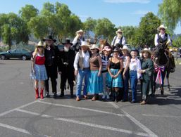 The Reel Cowboys - Right before participating in a 4th of July parade. Susan Johnston (L) Sara Clark (2nd from right)