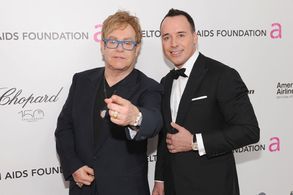 Elton John and David Furnish at an event for The 82nd Annual Academy Awards (2010)