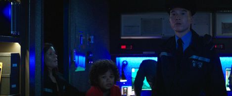 Neve Campbell, Carlo Yu, and Noah Cottrell in Skyscraper (2018)