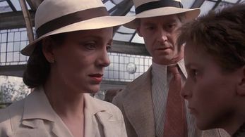 Christian Bale, Rupert Frazer, and Emily Richard in Empire of the Sun (1987)