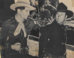 Tex Fletcher and Carl Mathews in Six-Gun Rhythm (1939)