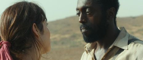 Olga Kurylenko and Kevin Layne in 15 Minutes of War (2019)