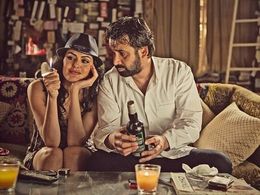 Karim Abdel Aziz and Dareen Haddad in The Blue Elephant (2014)