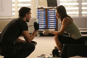 Kristen Gutoskie and Chris Wood in Containment (2016)