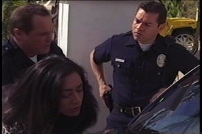 Still of Eddie Diaz with Aimee Garcia and Patrick Robert Smith in Standoff