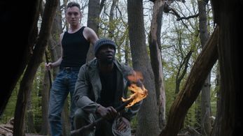 Dimeji Ewuoso and Michal Szpak in Hunting Ground (2019)