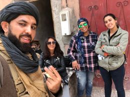 Still of Mustafa Haidari & crew members on set