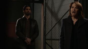 Deirdre Lovejoy and Mario Peguero in The Blacklist: Helen Maghi (No. 172) (2022)