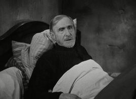 Maurice Schutz in It Happened at the Inn (1943)