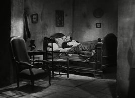 Maurice Schutz in It Happened at the Inn (1943)