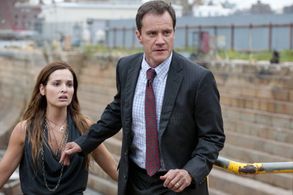 Tim DeKay and Gloria Votsis in White Collar (2009)