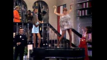 Hugh Hefner and Judy Carne in Rowan & Martin's Laugh-In (1967)