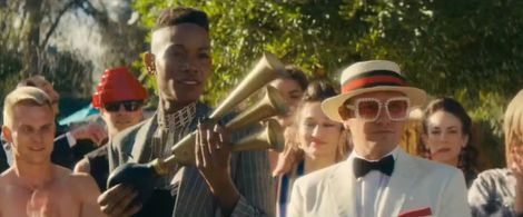 Paul Riley Fox as Elton John in Weird: The Al Yankovic Story