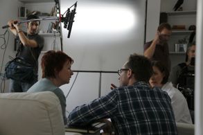 Staten speaks with Sarah Ball and Poppy Roe on the set of This Way Out