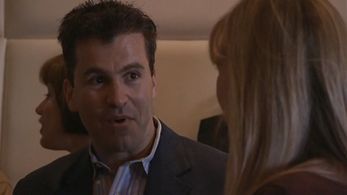 Caption from Gene Simmons Family Jewels (Ep. Genetopia) with Pamela Bowen.