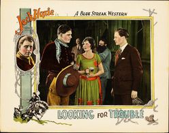 Edmund Cobb, Clark Comstock, Marceline Day, and Jack Hoxie in Looking for Trouble (1926)