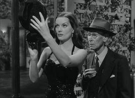 Hazel Brooks and Robert Dudley in Sleep, My Love (1948)