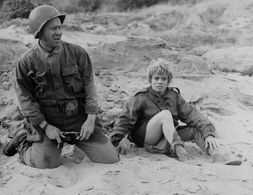 Scott Borland and Erika Peters in Heroes Die Young (1960)