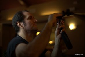 Thoughtfully adjusting the head on my audio boom