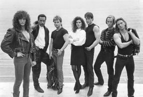 Michael Paré, Bernie Coulson, David Matheson, Marina Orsini, and Anthony Sherwood in Eddie and the Cruisers II: Eddie Li