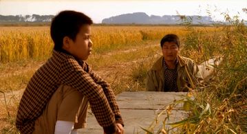 Song Kang-ho and Jae-eung Lee in Memories of Murder (2003)