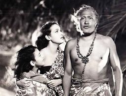 Kuulei De Clercq, Al Kikume, and Dorothy Lamour in The Hurricane (1937)